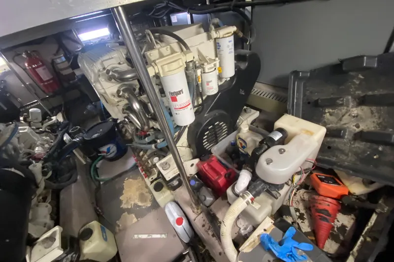 Slide: The Image of Engine room of a 2003 Sea Ray 480 Motor Yacht with visible components and equipment. - 54