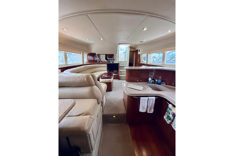 Slide: The Image of Luxurious interior of a 2003 Sea Ray 480 Motor Yacht with plush seating and modern amenities. - 42