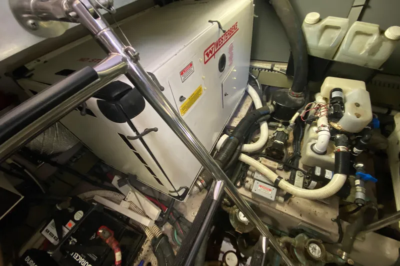 Slide: The Image of Engine room of a 2003 Sea Ray 480 Motor Yacht with Westerbeke generator. - 52