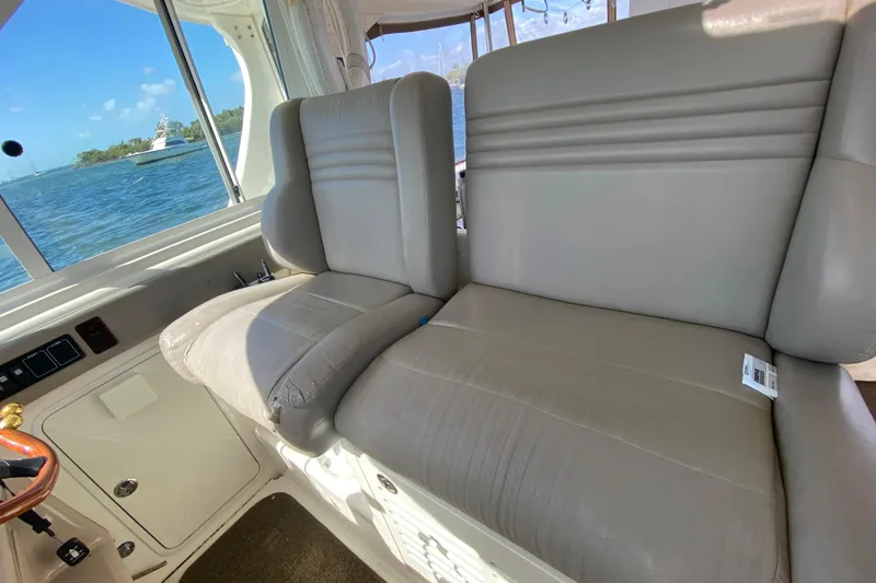 Slide: The Image of Interior seating of 2003 Sea Ray 480 Motor Yacht with water view. - 36