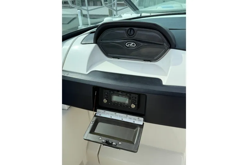 Slide: The Image of Dashboard of a 2006 Sea Ray 270 SLX boat with stereo system. - 12