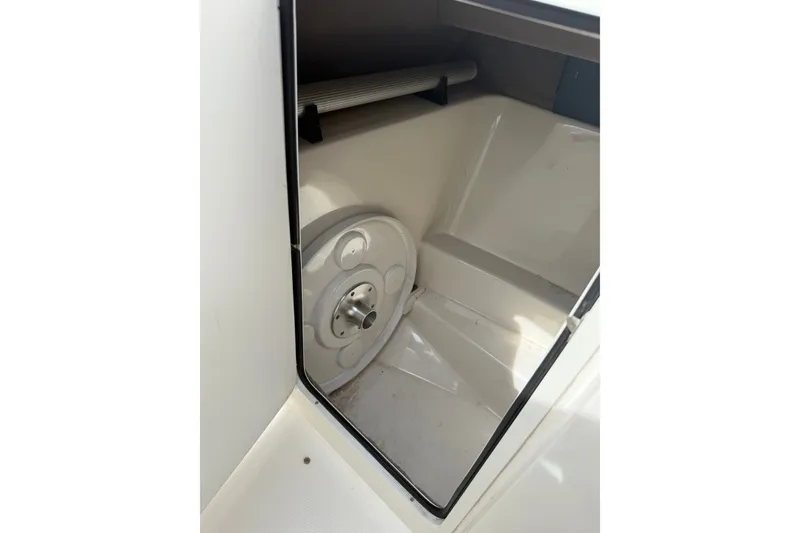 Slide: The Image of Interior storage compartment of a 2006 Sea Ray 270 SLX boat. - 14