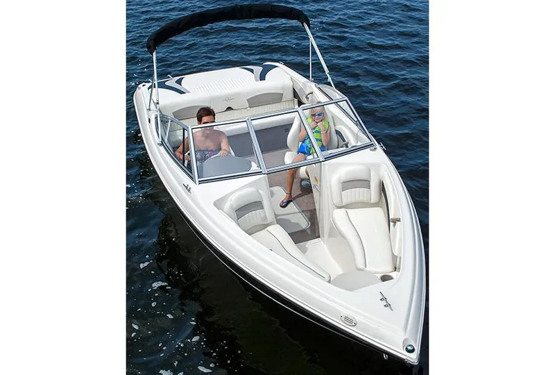 Slide: The Image of Manufacturer Provided Image: 2013 Stingray 195 LS/LX boat on water with passengers. - 9