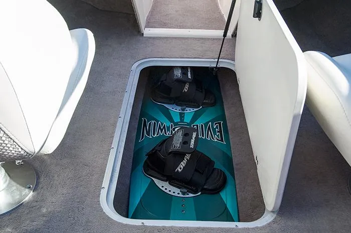 Slide: The Image of Manufacturer Provided Image: 2013 Stingray 195 LS/LX boat with wakeboard storage compartment. - 12