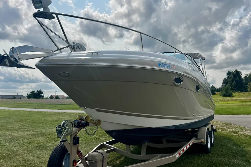 Slide: The Image of 2007 Four Winns 288 Vista boat on trailer under cloudy sky. - 4