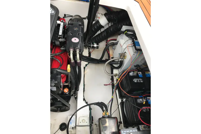 Slide: The Image of Engine compartment of a 2007 Four Winns 278 Vista boat, showing wiring and components. - 33
