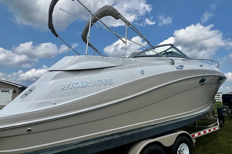 Slide: The Image of 2007 Four Winns 288 Vista boat on trailer under blue sky with clouds. - 5