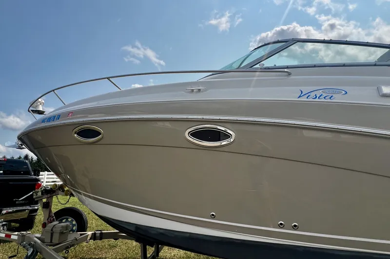 Slide: The Image of 2007 Four Winns 288 Vista boat on trailer under blue sky. - 9
