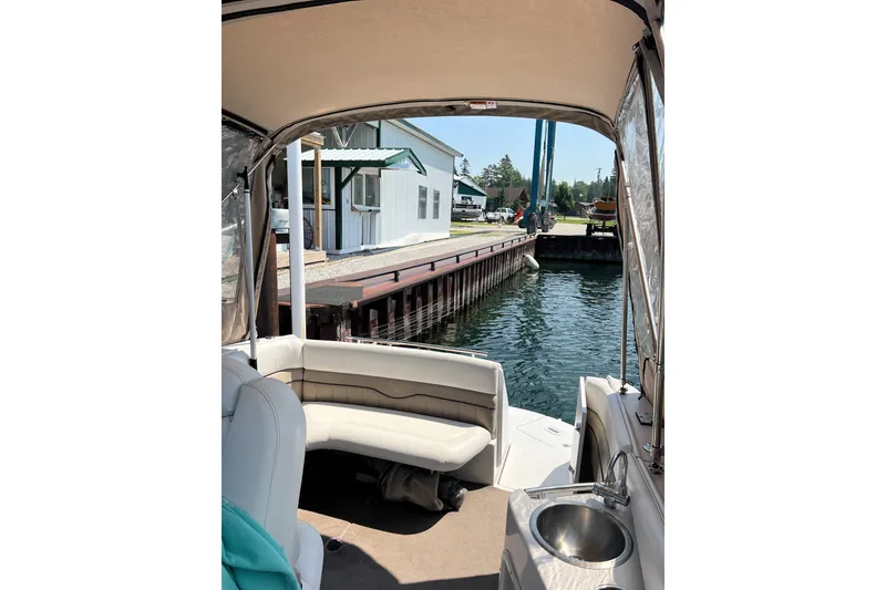 Slide: The Image of Interior view of 2007 Four Winns 288 Vista boat docked at marina. - 14