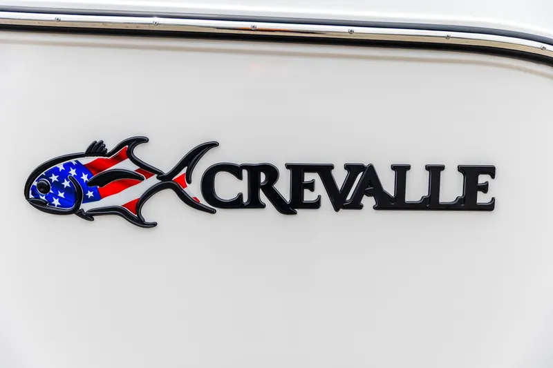 Slide: The Image of 2026 Crevalle 33 CSF logo with American flag fish design on white background. - 43