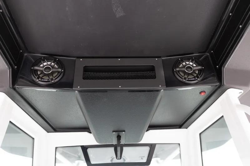 Slide: The Image of Interior view of 2026 Crevalle 33 CSF boat featuring dual JL Audio speakers. - 41