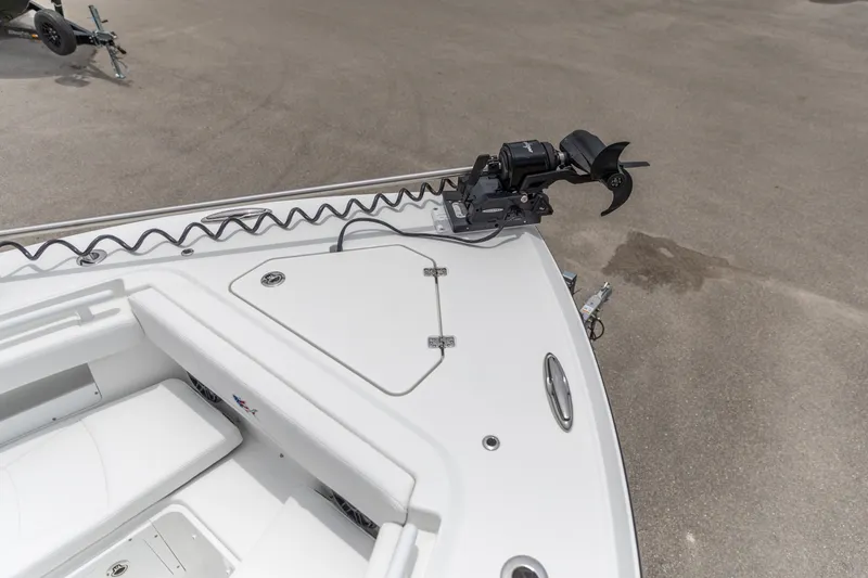 Slide: The Image of Bow of 2026 Crevalle 33 CSF boat with trolling motor and storage hatch. - 20