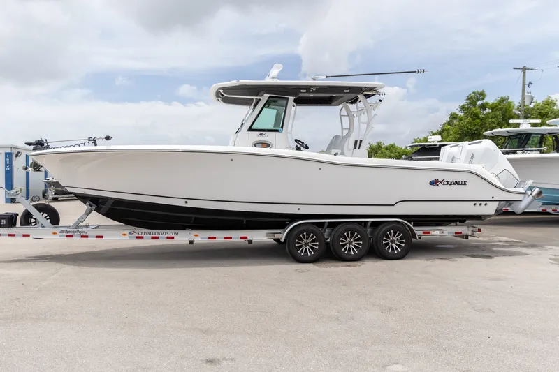 Slide: The Image of 2026 Crevalle 33 CSF boat on a trailer, side view. - 47