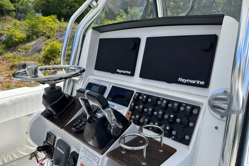 Slide: The Image of Control panel of a 2013 Southport 27 FE boat with Raymarine electronics. - 20