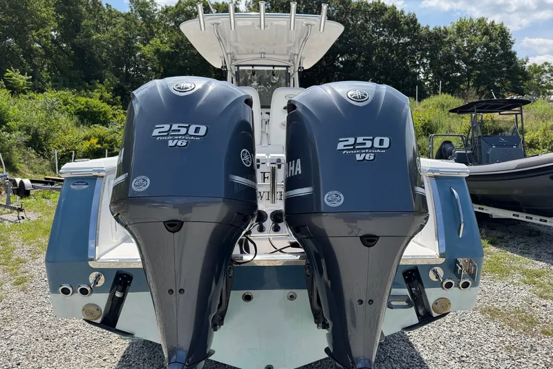 Slide: The Image of 2013 Southport 27 FE boat with twin Yamaha 250 V6 outboard engines. - 46
