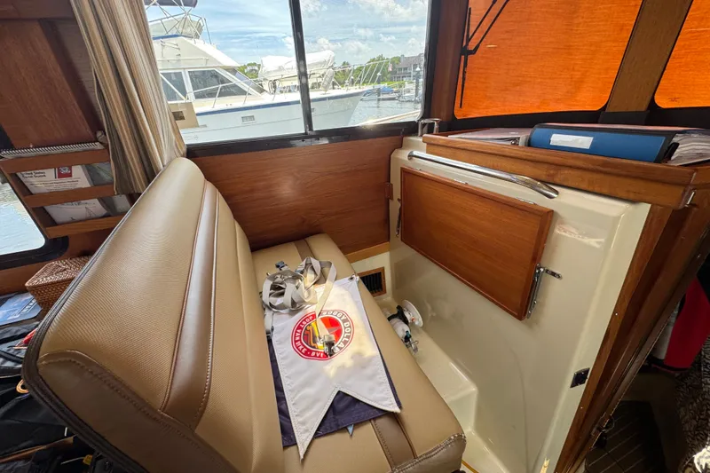Slide: The Image of Interior of 2020 Ranger Tugs R-31 CB with seating and nautical decor. - 22