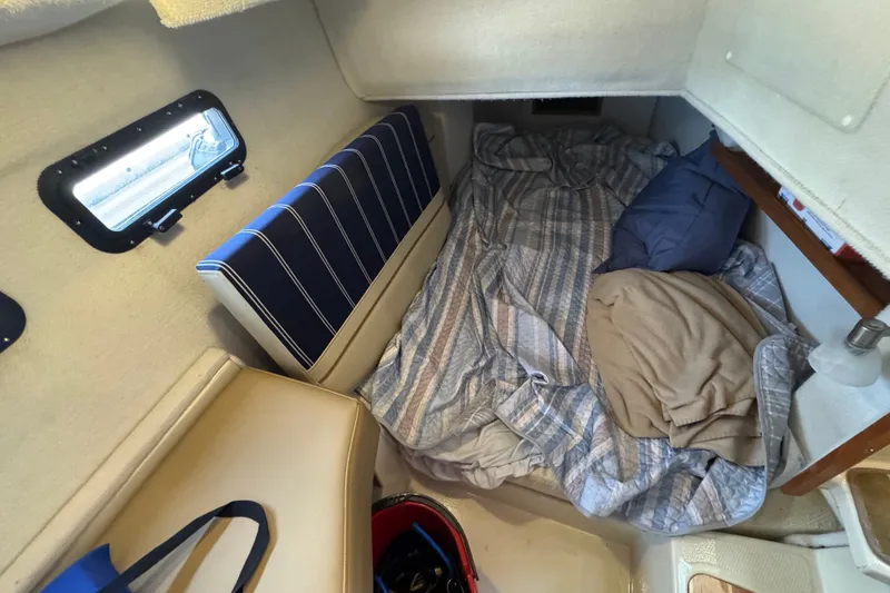 Slide: The Image of Cozy cabin interior of 2020 Ranger Tugs R-31 CB with bed and window view. - 19