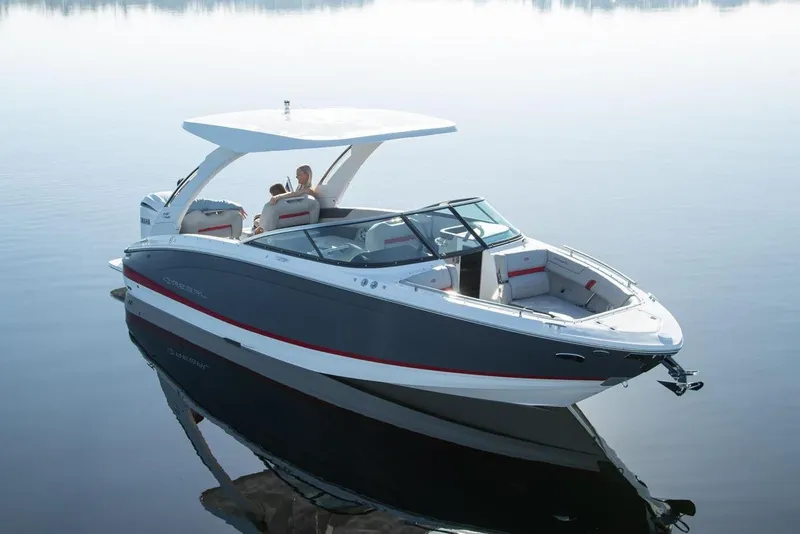 Slide: The Image of Manufacturer Provided Image: 2026 Regal LX6 boat on calm water, featuring sleek design and modern amenities. - 9