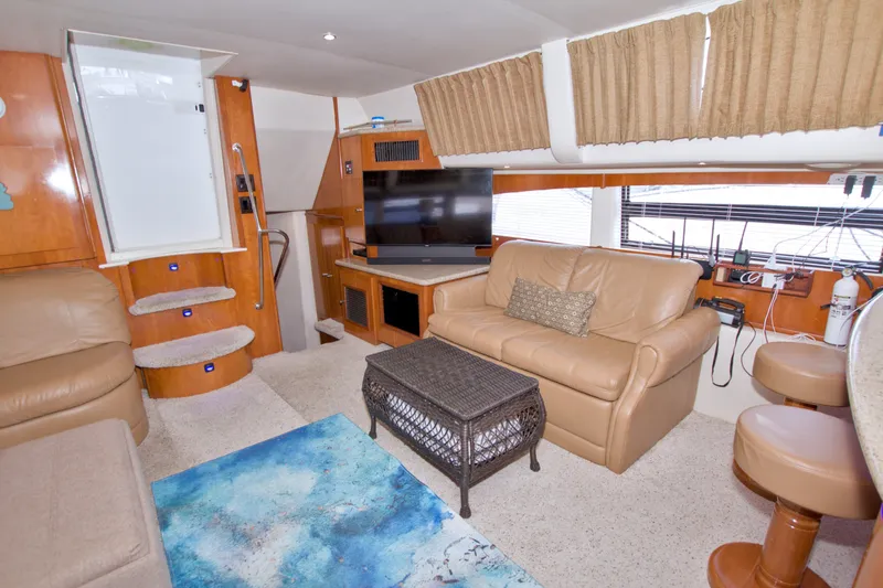 Slide: The Image of Luxurious interior of 2001 Carver 466 Motor Yacht with leather seating and modern amenities. - 55
