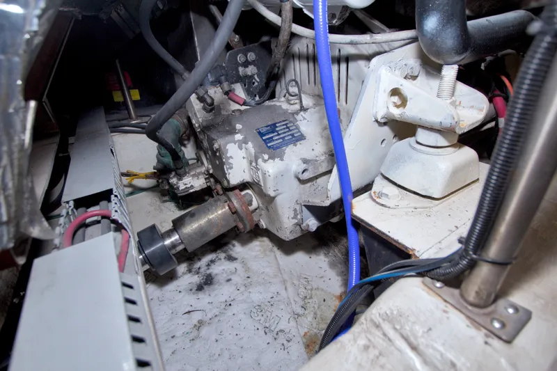 Slide: The Image of Engine compartment of a 2001 Carver 466 Motor Yacht, showing mechanical components and wiring. - 78
