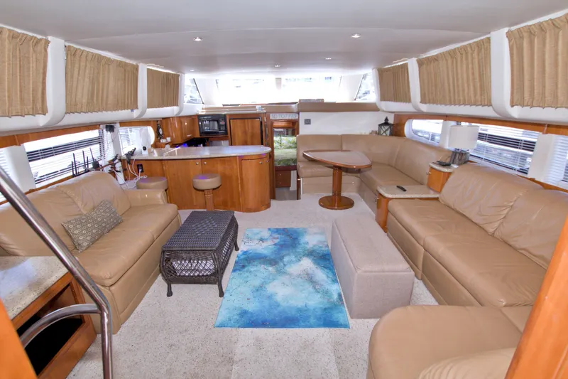 Slide: The Image of Luxurious interior of 2001 Carver 466 Motor Yacht with leather seating and modern amenities. - 32
