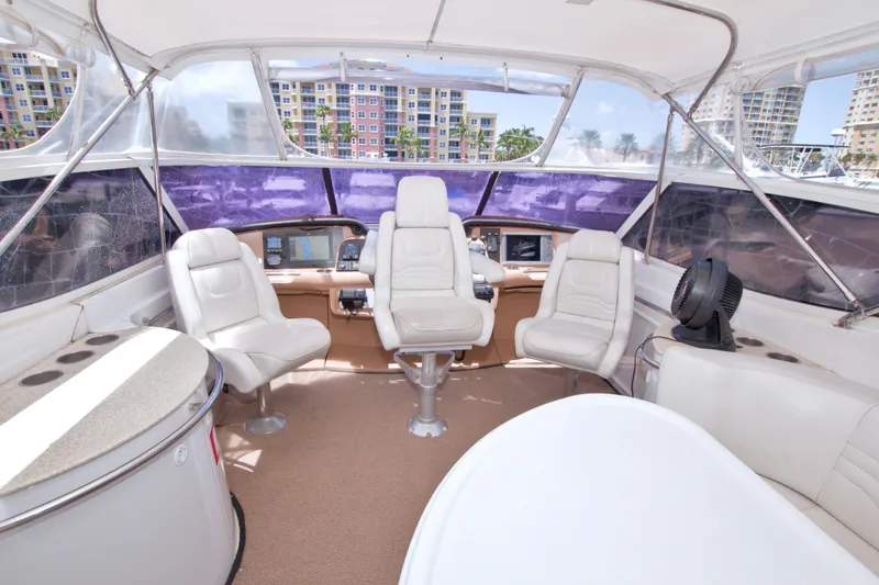 Slide: The Image of Luxurious interior of 2001 Carver 466 Motor Yacht with plush seating and modern controls. - 20