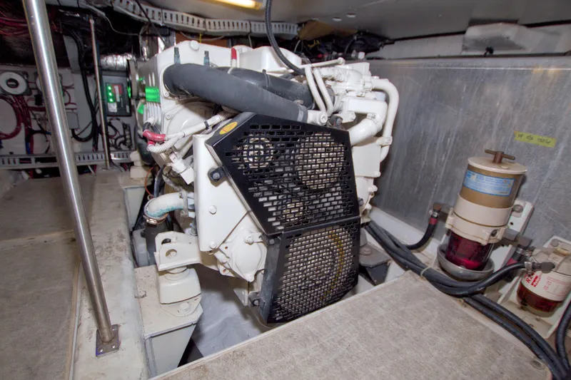 Slide: The Image of Engine room of 2001 Carver 466 Motor Yacht, showcasing mechanical components and systems. - 81