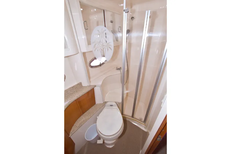 Slide: The Image of Bathroom interior of 2001 Carver 466 Motor Yacht with shower and toilet. - 64