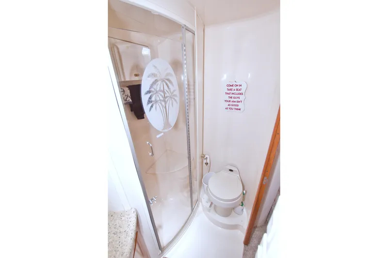 Slide: The Image of Bathroom in 2001 Carver 466 Motor Yacht with shower and toilet. - 48