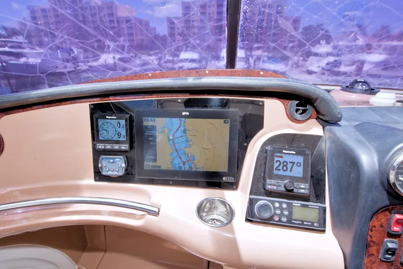 Slide: The Image of Helm of 2001 Carver 466 Motor Yacht with navigation instruments and displays. - 26