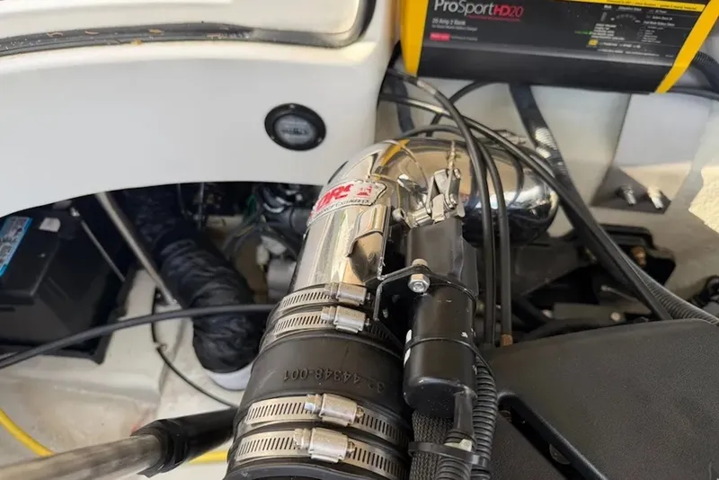 Slide: The Image of Engine compartment of a 2008 Cobalt 252 boat with visible components and wiring. - 17
