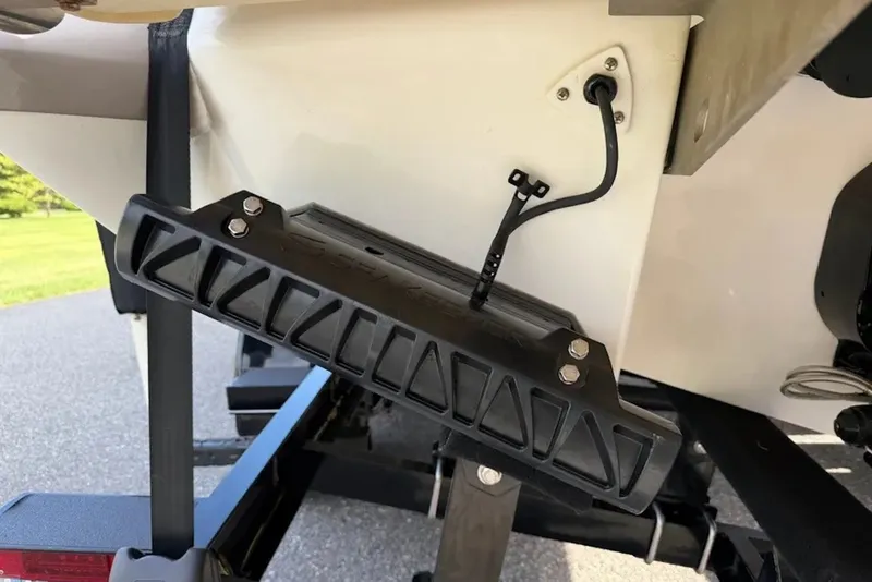 Slide: The Image of Close-up of a 2008 Cobalt 252 boat's transom with mounted equipment. - 16