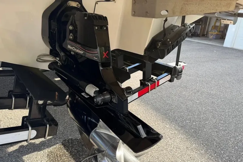 Slide: The Image of Close-up of a 2008 Cobalt 252 boat's MerCruiser engine and propeller system. - 18