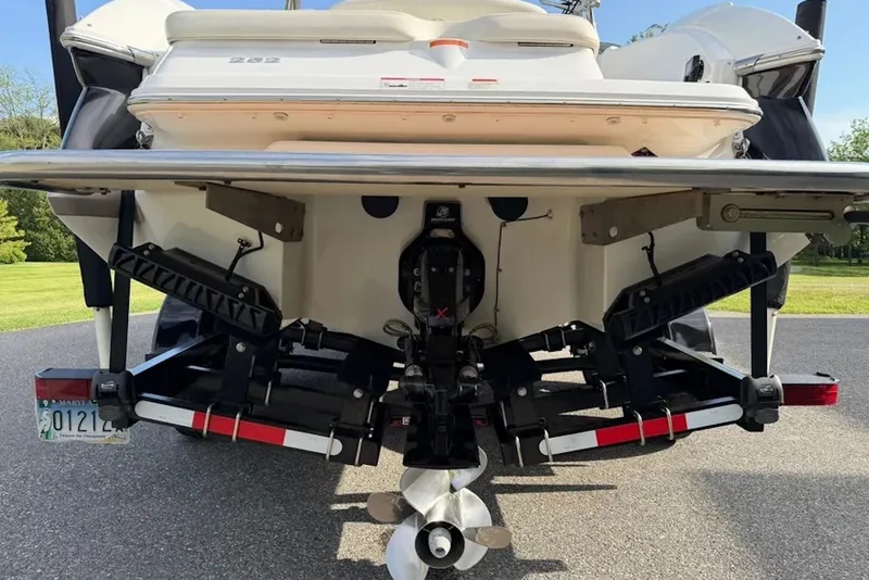 Slide: The Image of Rear view of a 2008 Cobalt 252 boat with propeller and trim tabs. - 19