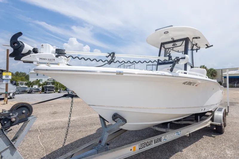 Slide: The Image of 2019 Sea Hunt BX25FS boat on trailer with Minn Kota trolling motor. - 3