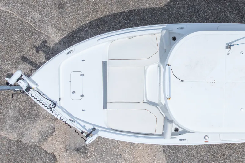 Slide: The Image of Overhead view of 2019 Sea Hunt BX25FS boat's bow with seating and trolling motor. - 8