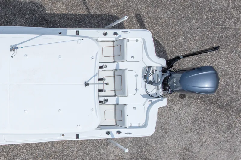 Slide: The Image of Top view of a 2019 Sea Hunt BX25FS boat with outboard motor. - 9