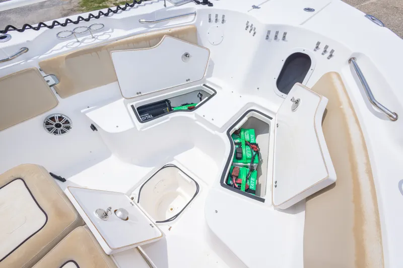 Slide: The Image of 2016 Sea Fox 266 Commander boat storage compartments with open hatches and visible equipment. - 32