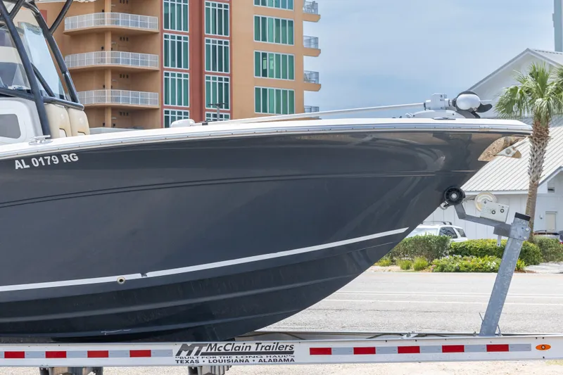 Slide: The Image of 2016 Sea Fox 266 Commander boat on trailer, urban background. - 10