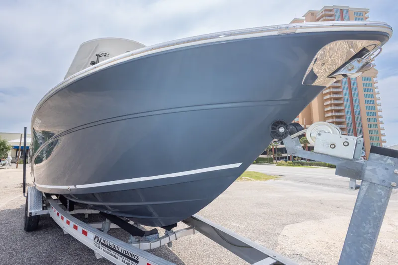 Slide: The Image of 2016 Sea Fox 266 Commander boat on trailer, urban background. - 11