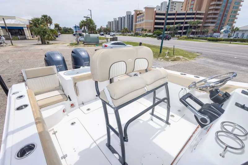 Slide: The Image of 2016 Sea Fox 266 Commander boat interior with dual engines and seating. - 27