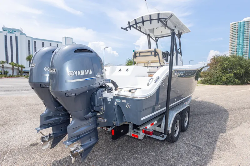Slide: The Image of 2016 Sea Fox 266 Commander boat with dual Yamaha engines on a trailer. - 53