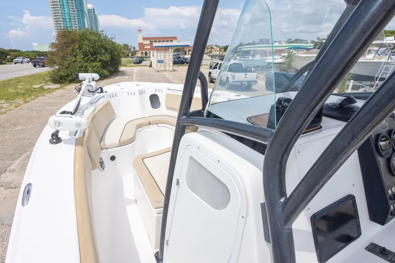Slide: The Image of 2016 Sea Fox 266 Commander boat with beige seating and modern dashboard. - 41