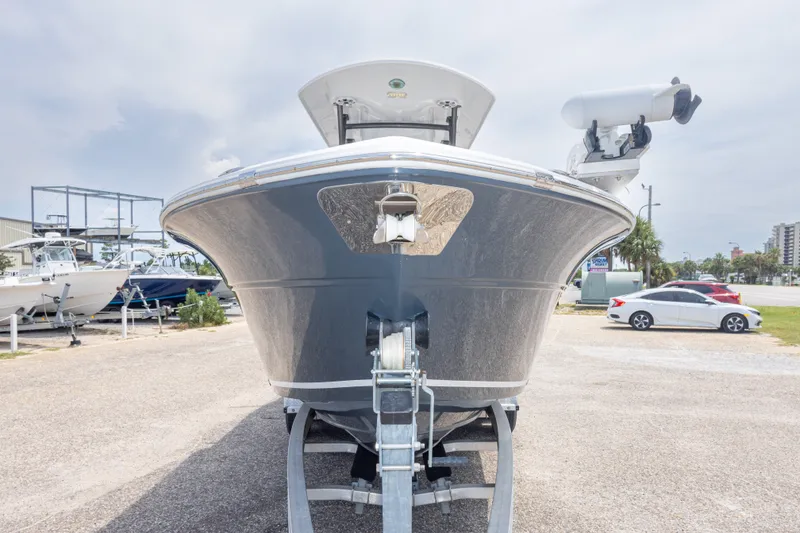 Slide: The Image of 2016 Sea Fox 266 Commander boat on trailer, parked outdoors under cloudy sky. - 13