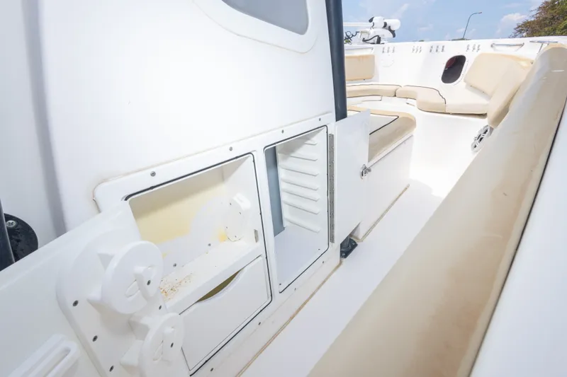 Slide: The Image of 2016 Sea Fox 266 Commander boat interior with storage compartments and seating. - 37