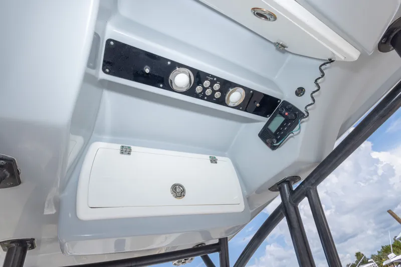 Slide: The Image of 2016 Sea Fox 266 Commander boat console with controls and radio equipment. - 42