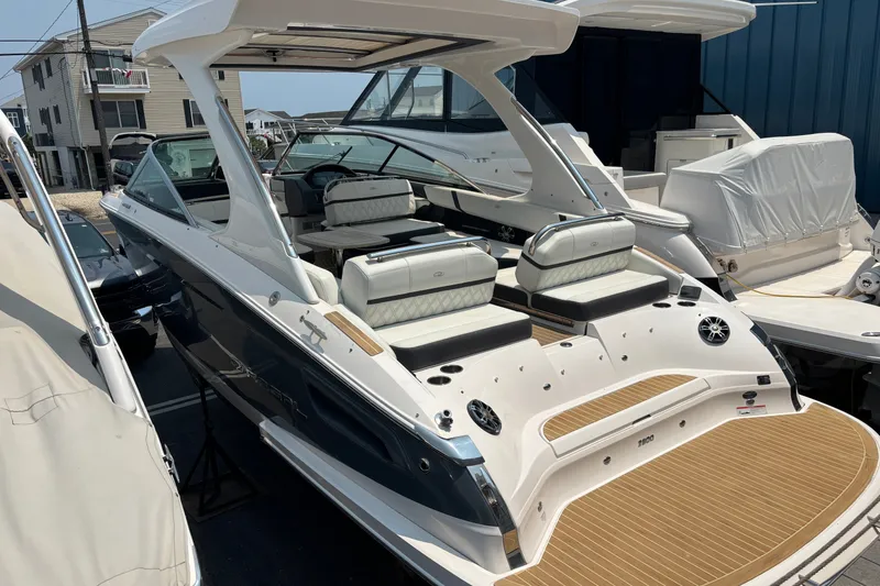 Slide: The Image of 2020 Regal 2800 Bowrider boat with spacious seating and sleek design. - 4