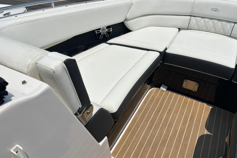 Slide: The Image of Luxurious seating on a 2020 Regal 2800 Bowrider boat with elegant white upholstery. - 8
