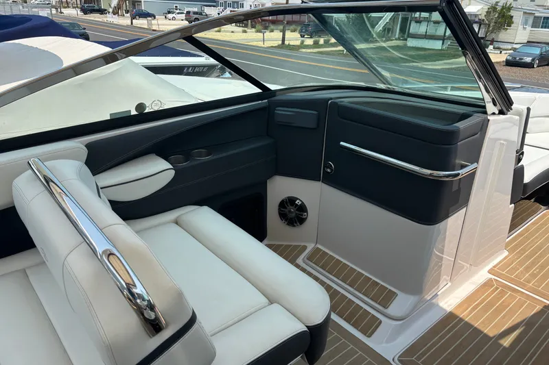 Slide: The Image of 2020 Regal 2800 Bowrider interior with sleek seating and modern dashboard design. - 13