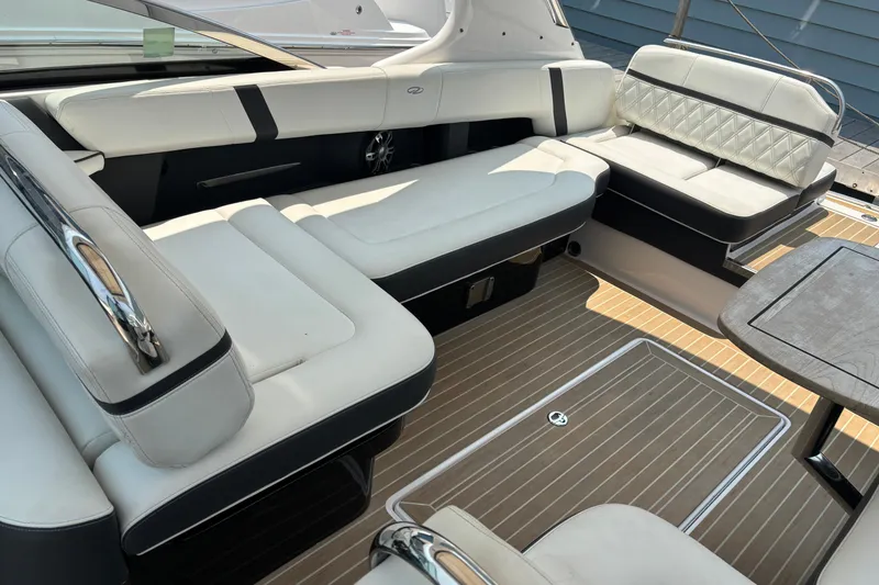 Slide: The Image of Luxurious seating area on a 2020 Regal 2800 Bowrider boat with elegant upholstery. - 14